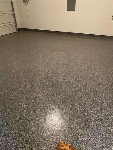 a view of room with a ceiling fan