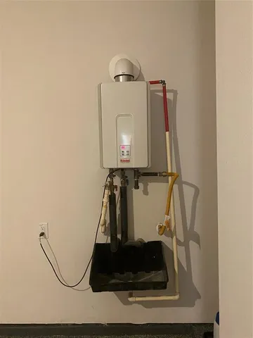 a room with a mirror and gym equipment