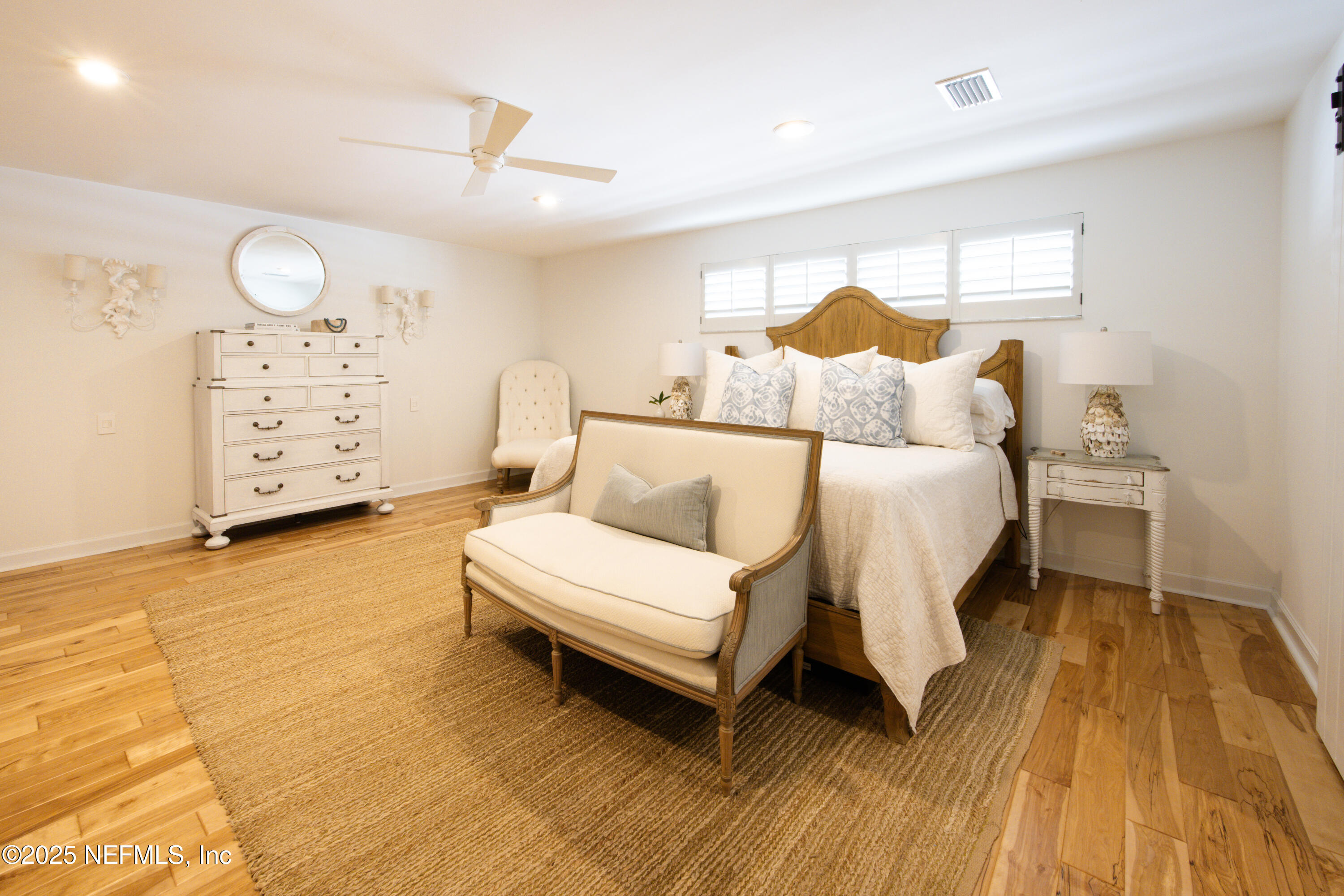 440 Ocean Boulevard Atlantic Beach, FL 32233 - Photo 15 of 34 a bedroom with a bed and window