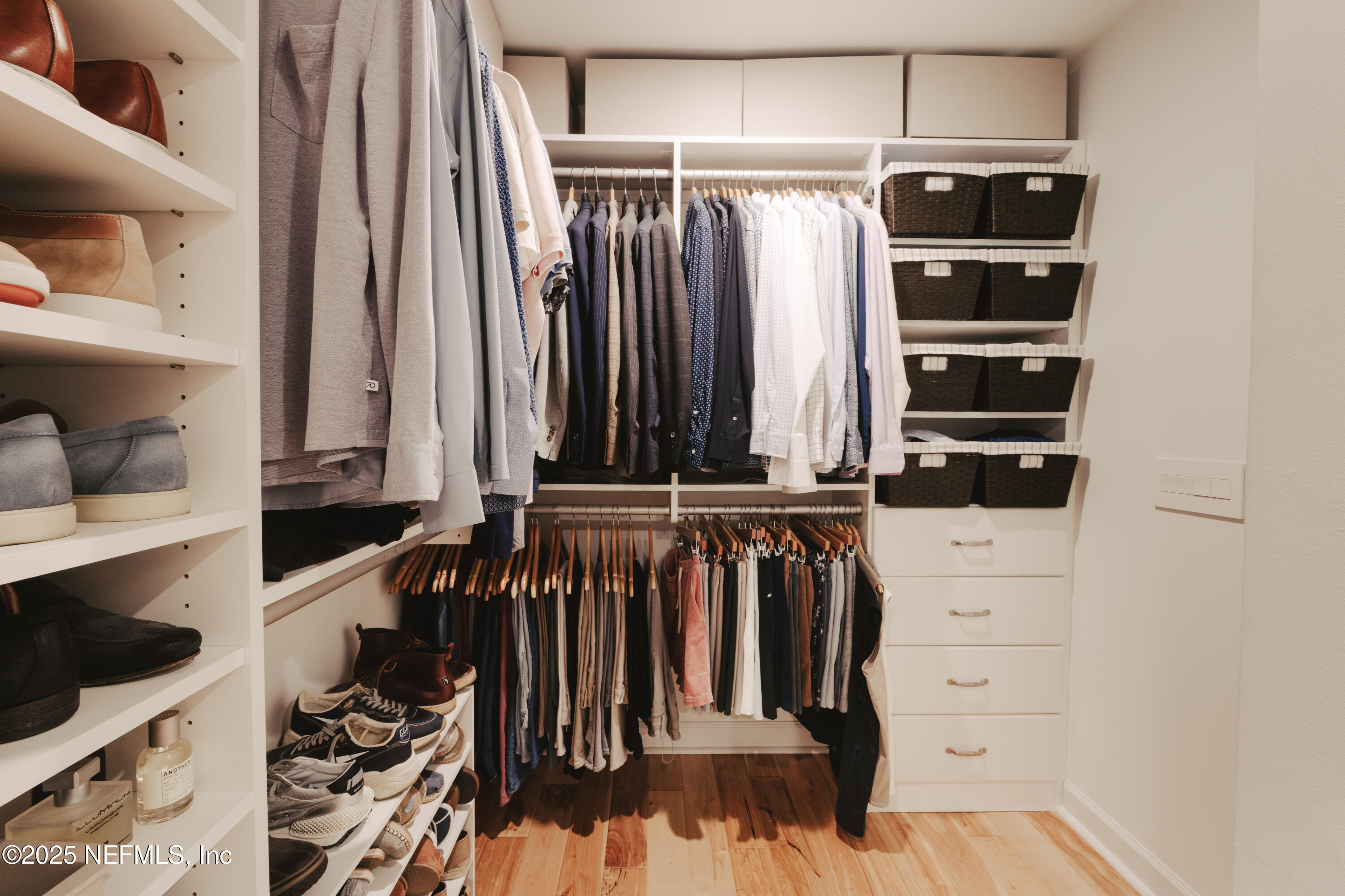 440 Ocean Boulevard Atlantic Beach, FL 32233 - Photo 17 of 34 a view of walk in closet with clothes and shoes