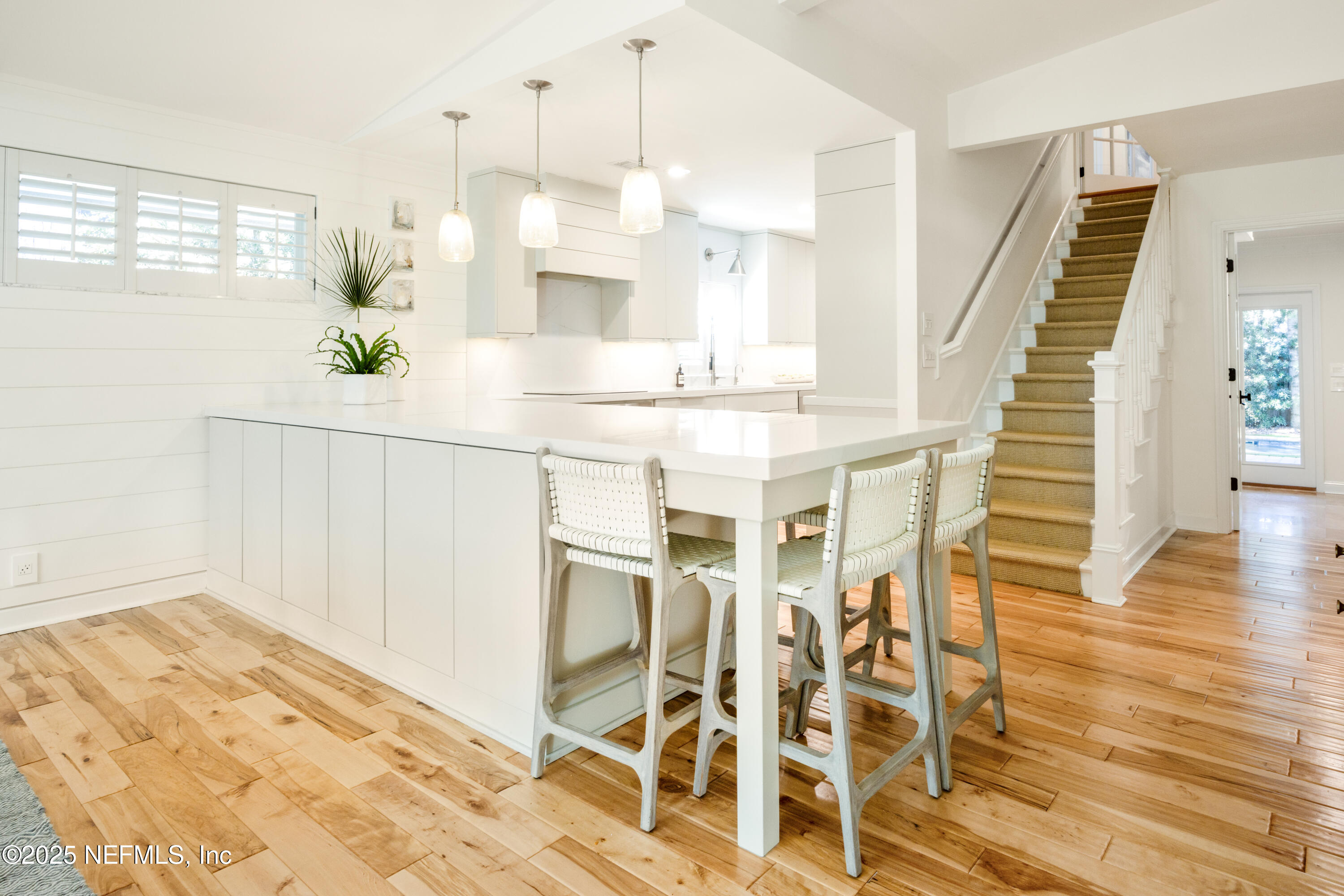 440 Ocean Boulevard Atlantic Beach, FL 32233 - Photo 6 of 34 a view of kitchen with furniture and wooden floor