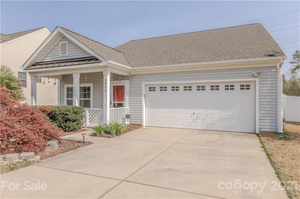 8026 Bryson Road Indian Land, SC 29707 - Photo 1 of 33 a front view of a house with garden