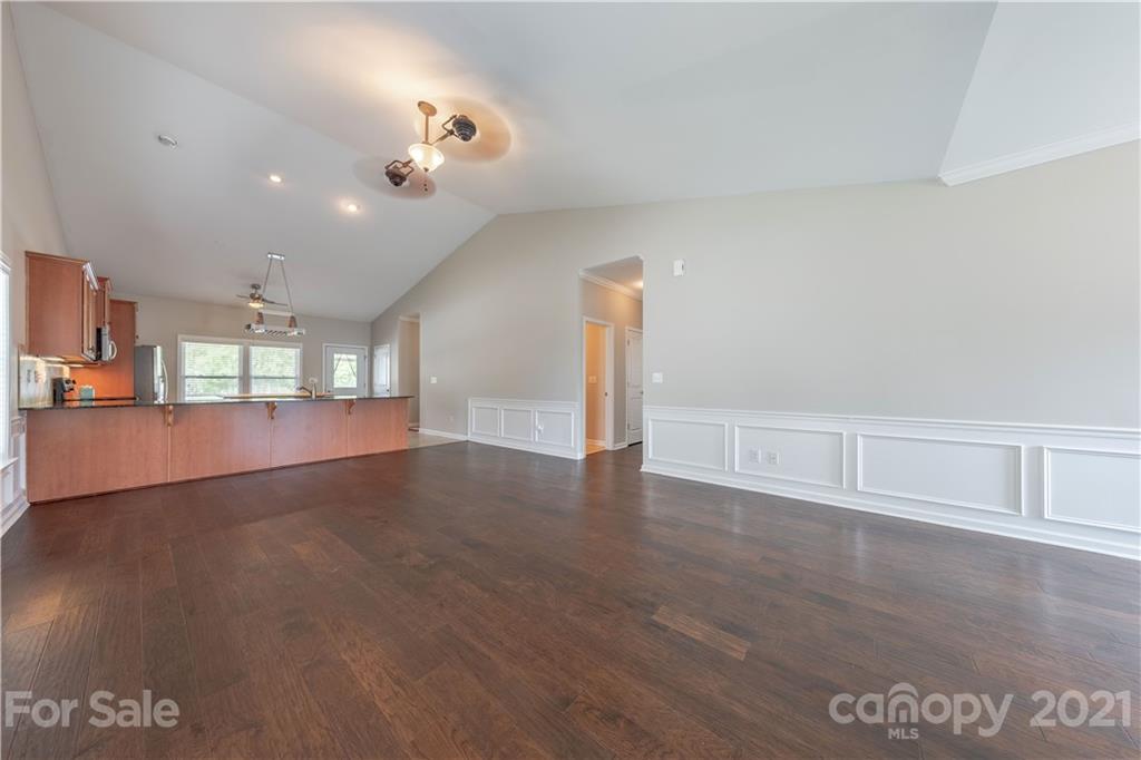8026 Bryson Road Indian Land, SC 29707 - Photo 17 of 33 a view of a livingroom with wooden floor