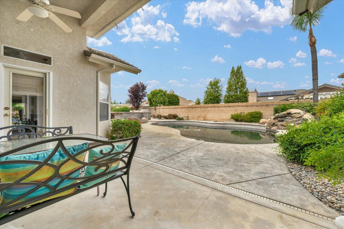 2881 Indianapolis Avenue Clovis, CA 93611 - Photo 56 of 76 a view of swimming pool with outdoor seating and city view