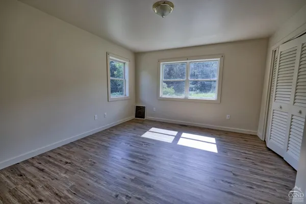 a view of a city with a lake