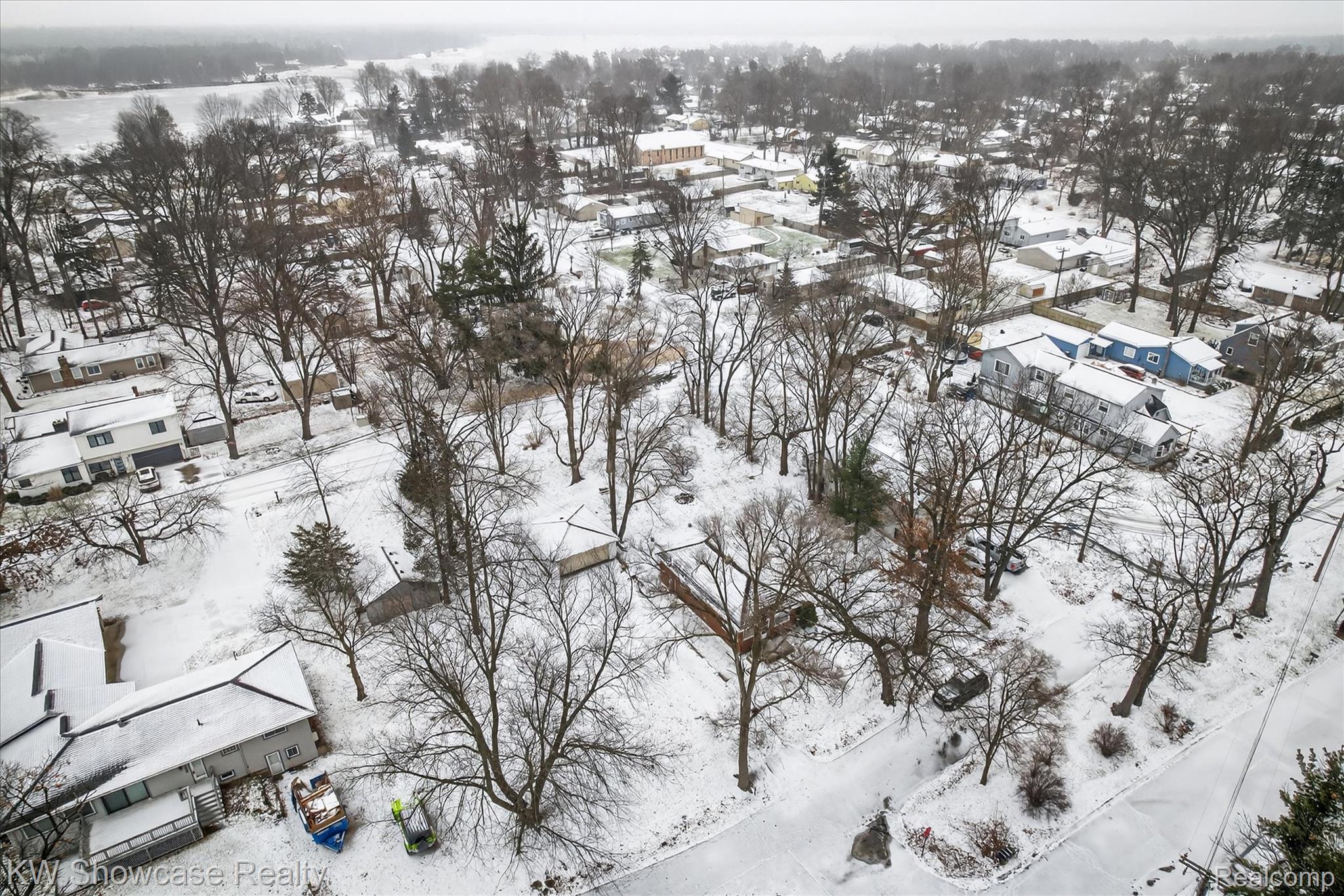 1860 Ladd Road Walled Lake, MI 48390 - Photo 45 of 48 Snowy aerial view with a residential view