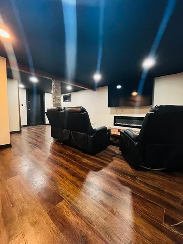 a bed sitting in a room next to a building