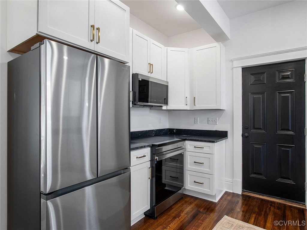 109 Overbrook Road Richmond, VA 23222 - Photo 14 of 47 a kitchen with stainless steel appliances a refrigerator stove and sink