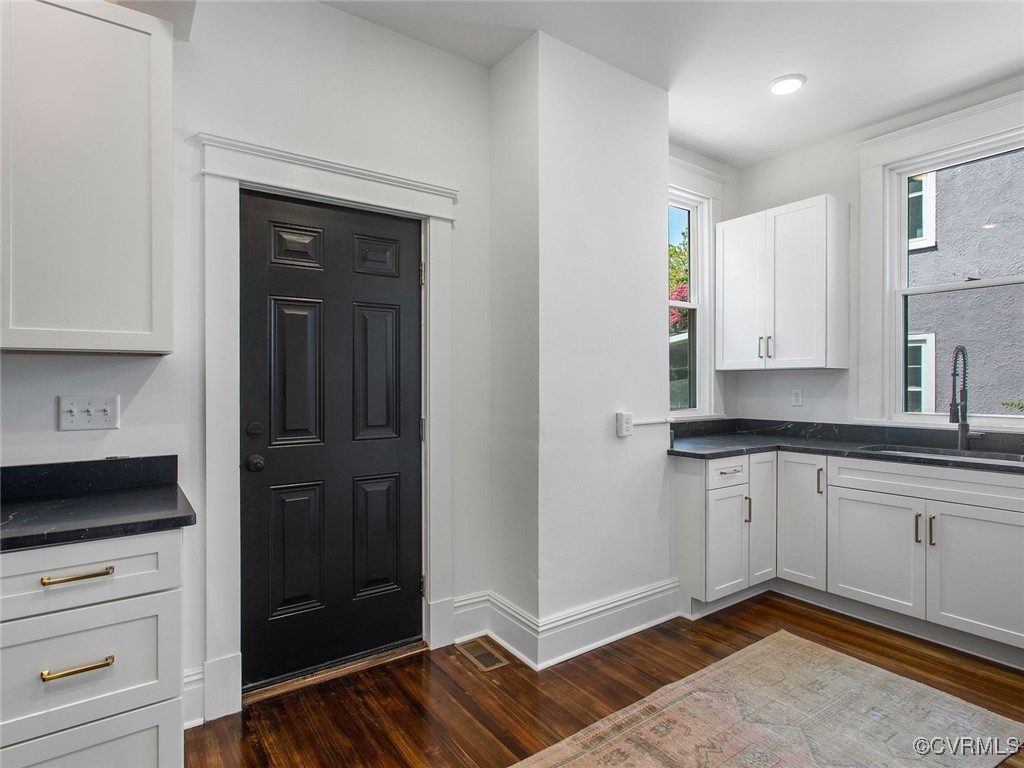 109 Overbrook Road Richmond, VA 23222 - Photo 15 of 47 a kitchen with granite countertop cabinets and window