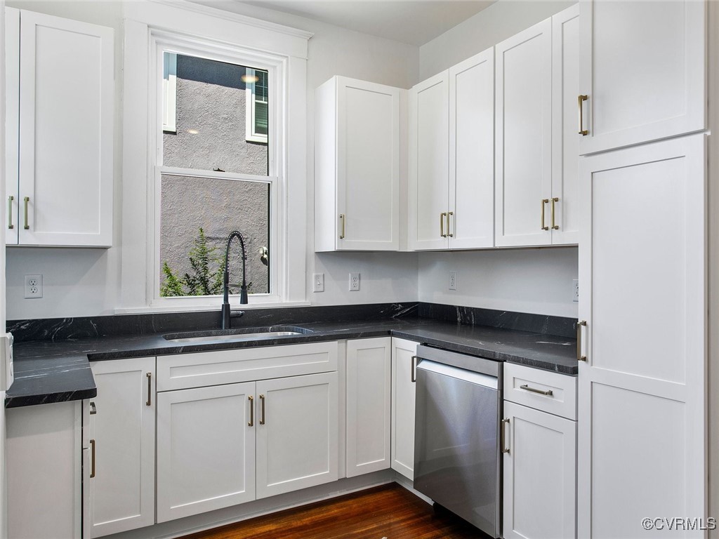 109 Overbrook Road Richmond, VA 23222 - Photo 16 of 47 a kitchen with white cabinets and white appliances