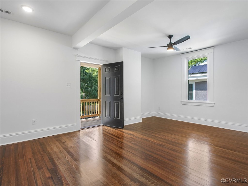 109 Overbrook Road Richmond, VA 23222 - Photo 26 of 47 a view of an empty room with wooden floor and a window