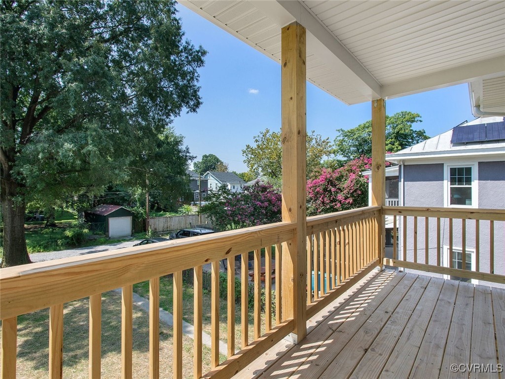 109 Overbrook Road Richmond, VA 23222 - Photo 27 of 47 a view of a wooden balcony and trees