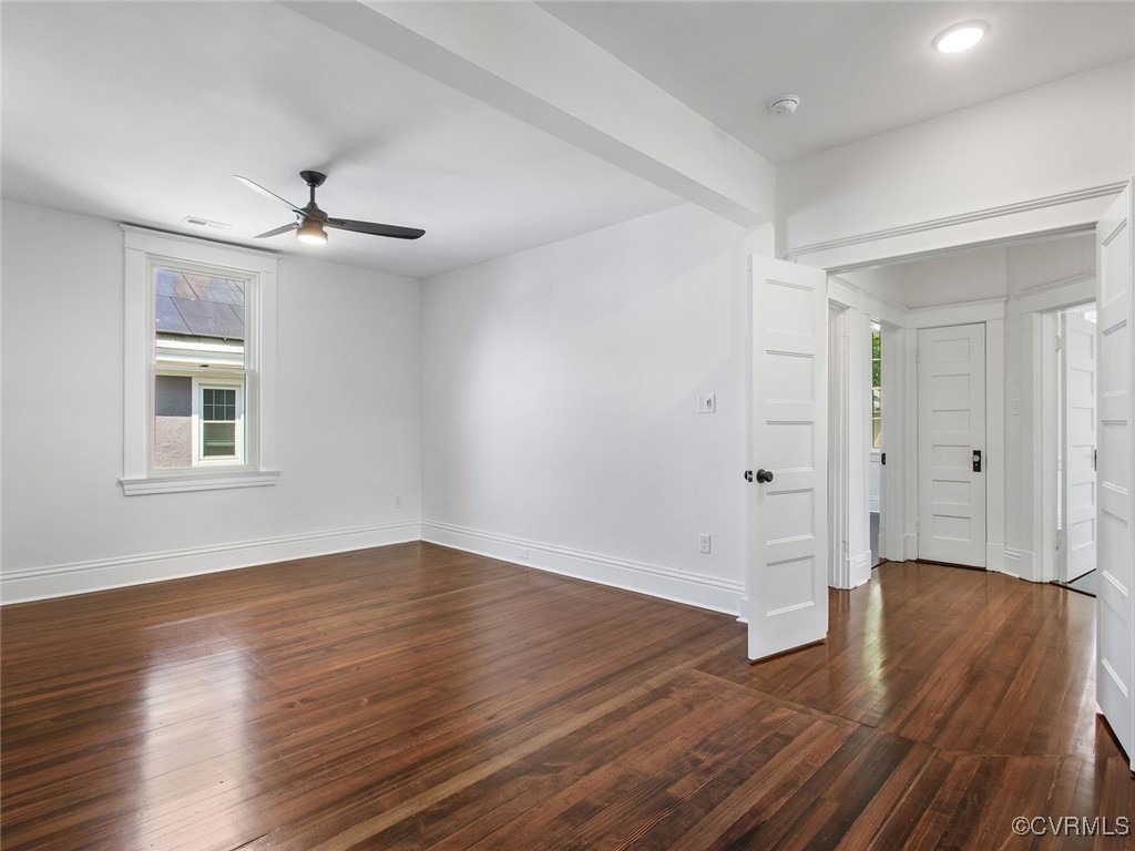 109 Overbrook Road Richmond, VA 23222 - Photo 28 of 47 a view of empty room with wooden floor and ceiling fan