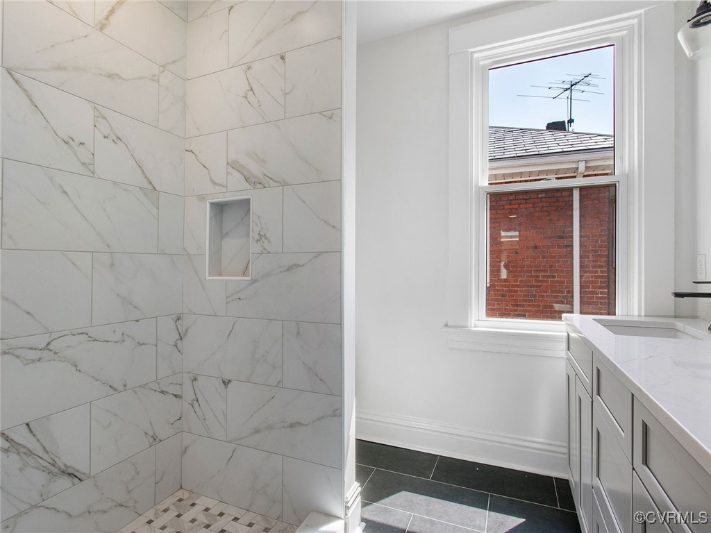 109 Overbrook Road Richmond, VA 23222 - Photo 31 of 47 a bathroom with a granite countertop window and a sink