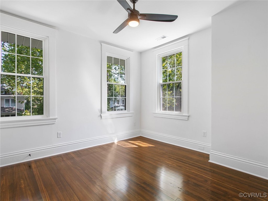 109 Overbrook Road Richmond, VA 23222 - Photo 33 of 47 a view of an empty room with wooden floor and a window