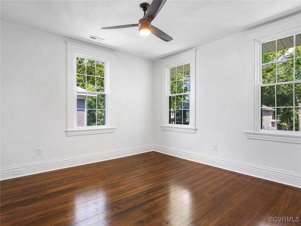 109 Overbrook Road Richmond, VA 23222 - Photo 34 of 47 a view of an empty room with wooden floor and a window