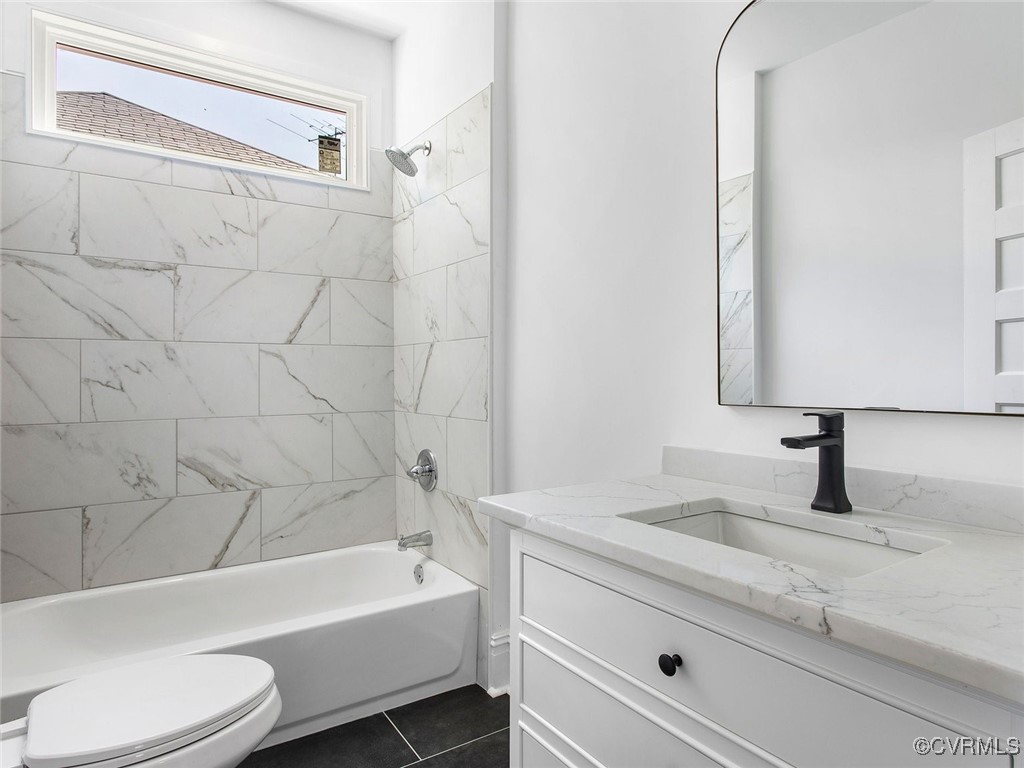 109 Overbrook Road Richmond, VA 23222 - Photo 36 of 47 a bathroom with a granite countertop bathtub shower sink vanity mirror and toilet