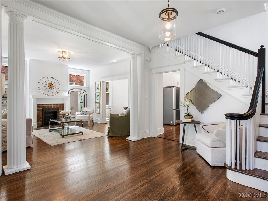 109 Overbrook Road Richmond, VA 23222 - Photo 7 of 47 a living room with fireplace furniture and a wooden floor