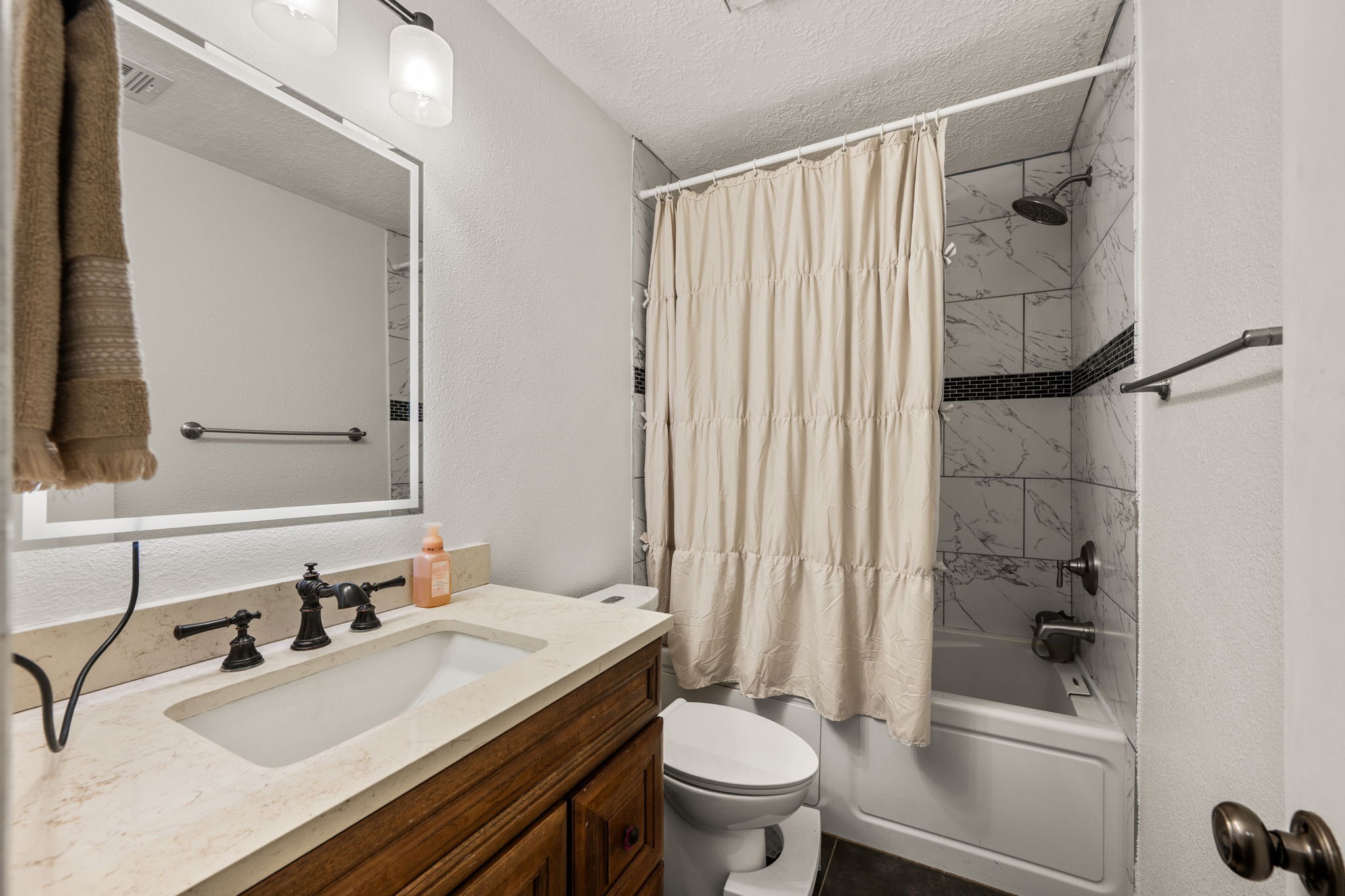 2415 Whispering Springs Drive Spring, TX 77373 - Photo 22 of 28 Secondary bathroom with extra deep soaking tub.