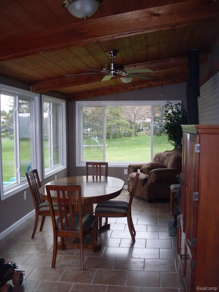913 Woodruff Lake Road Highland, MI 48357 - Photo 13 of 31 13 Florida Room.JPG