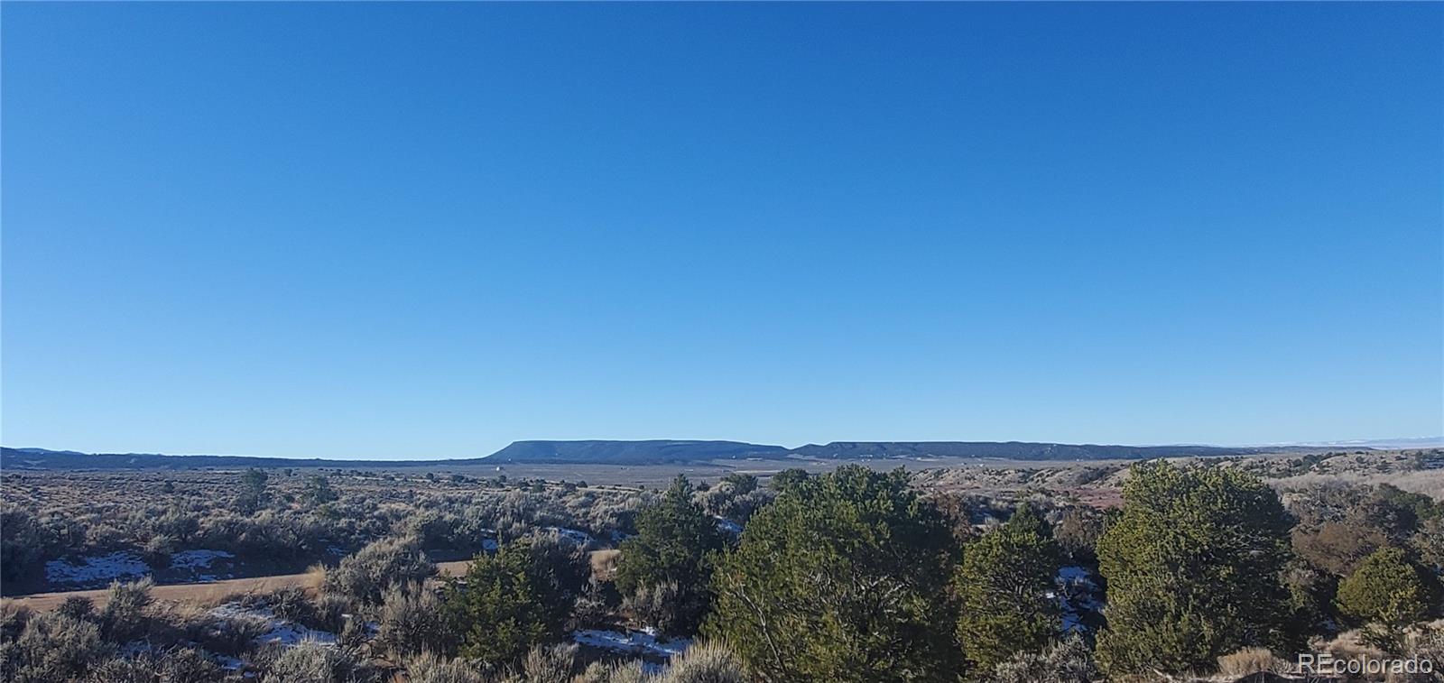 Lot 4125 Woodman Road Fort Garland, CO 81133 - Photo 6 of 14 a view of city and green space