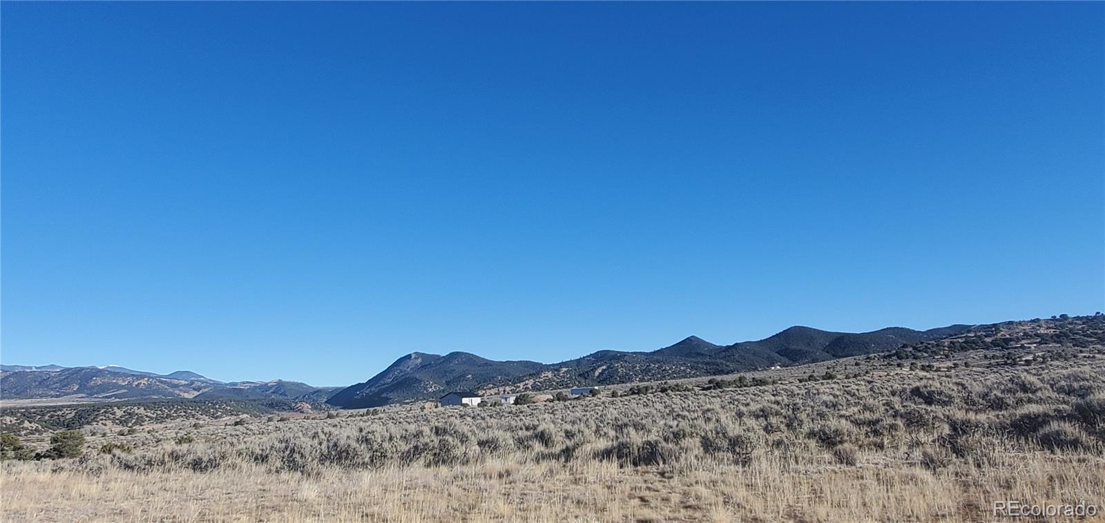 Lot 4125 Woodman Road Fort Garland, CO 81133 - Photo 7 of 14 a view of a mountain
