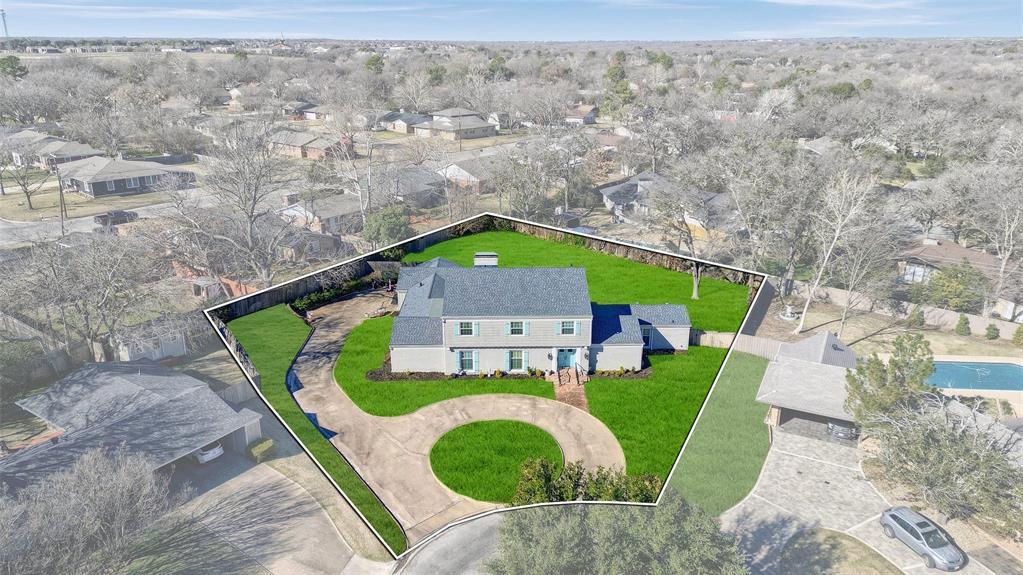 1016 Crestview Drive Sherman, TX 75092 - Photo 12 of 13 a picture of outdoor space with garden