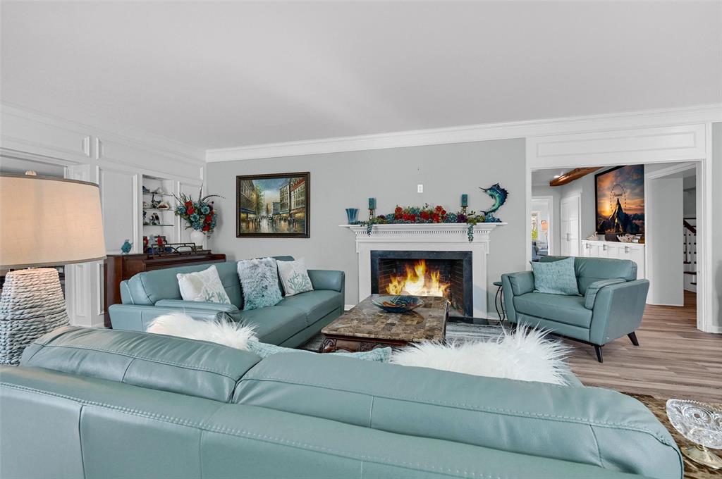 1016 Crestview Drive Sherman, TX 75092 - Photo 3 of 13 a living room with furniture and a fireplace
