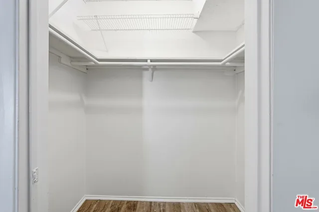 a view of an empty walk in closet