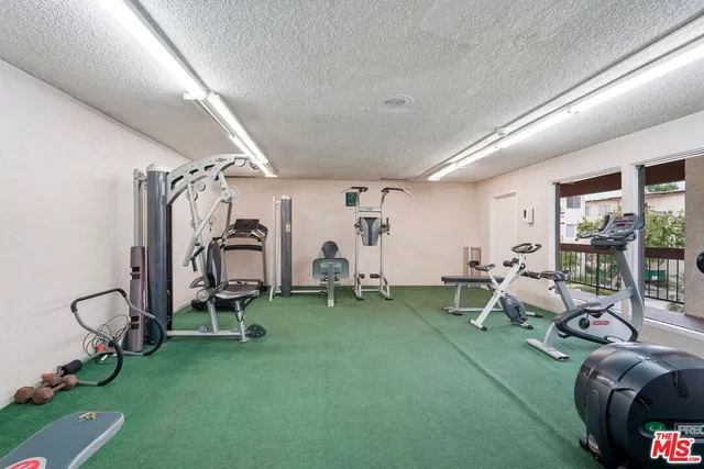 a view of swimming pool with outdoor seating