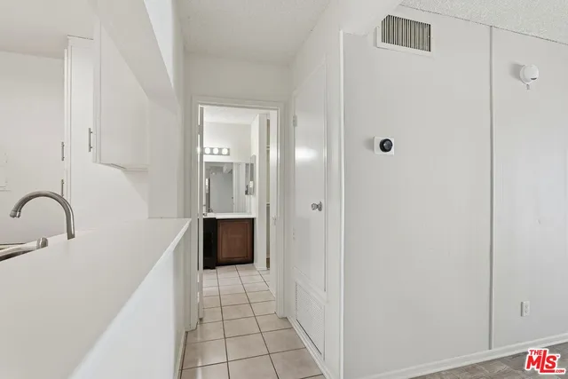 a bathroom with a sink and a shower