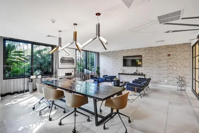 a patio with table and chairs