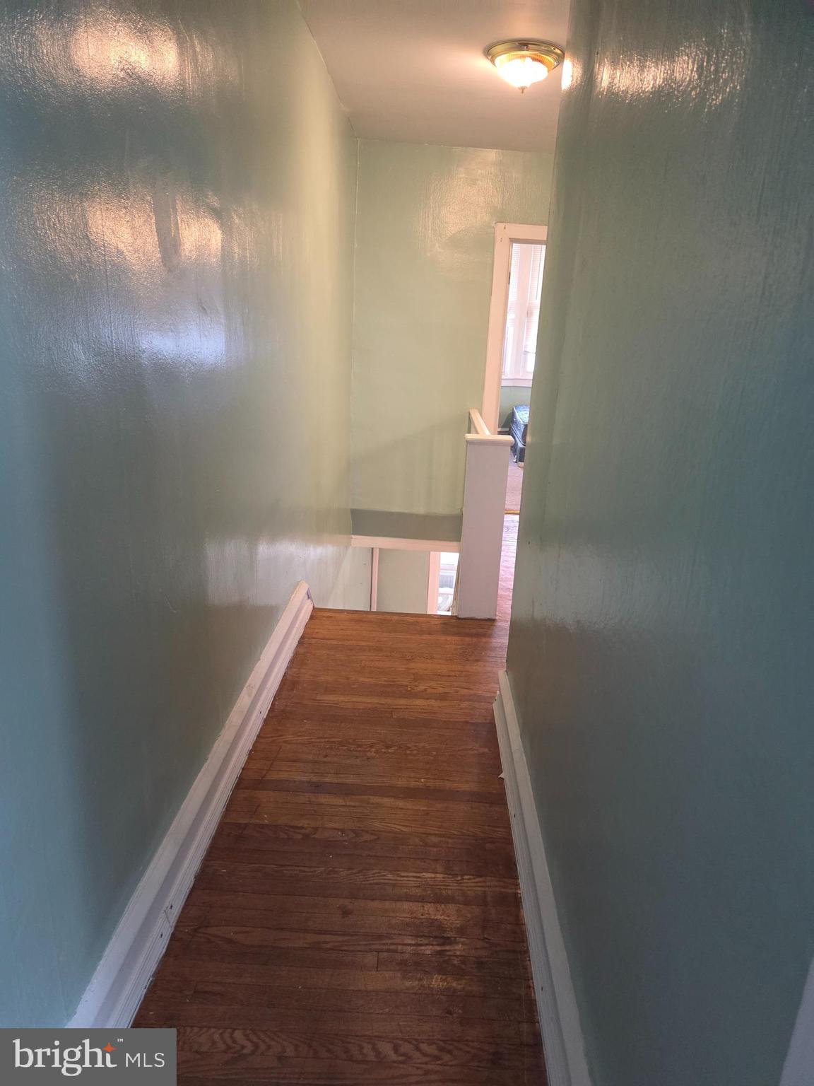 2014 South 68th Street Philadelphia, PA 19142 - Photo 6 of 9 a view of a hallway with wooden floor
