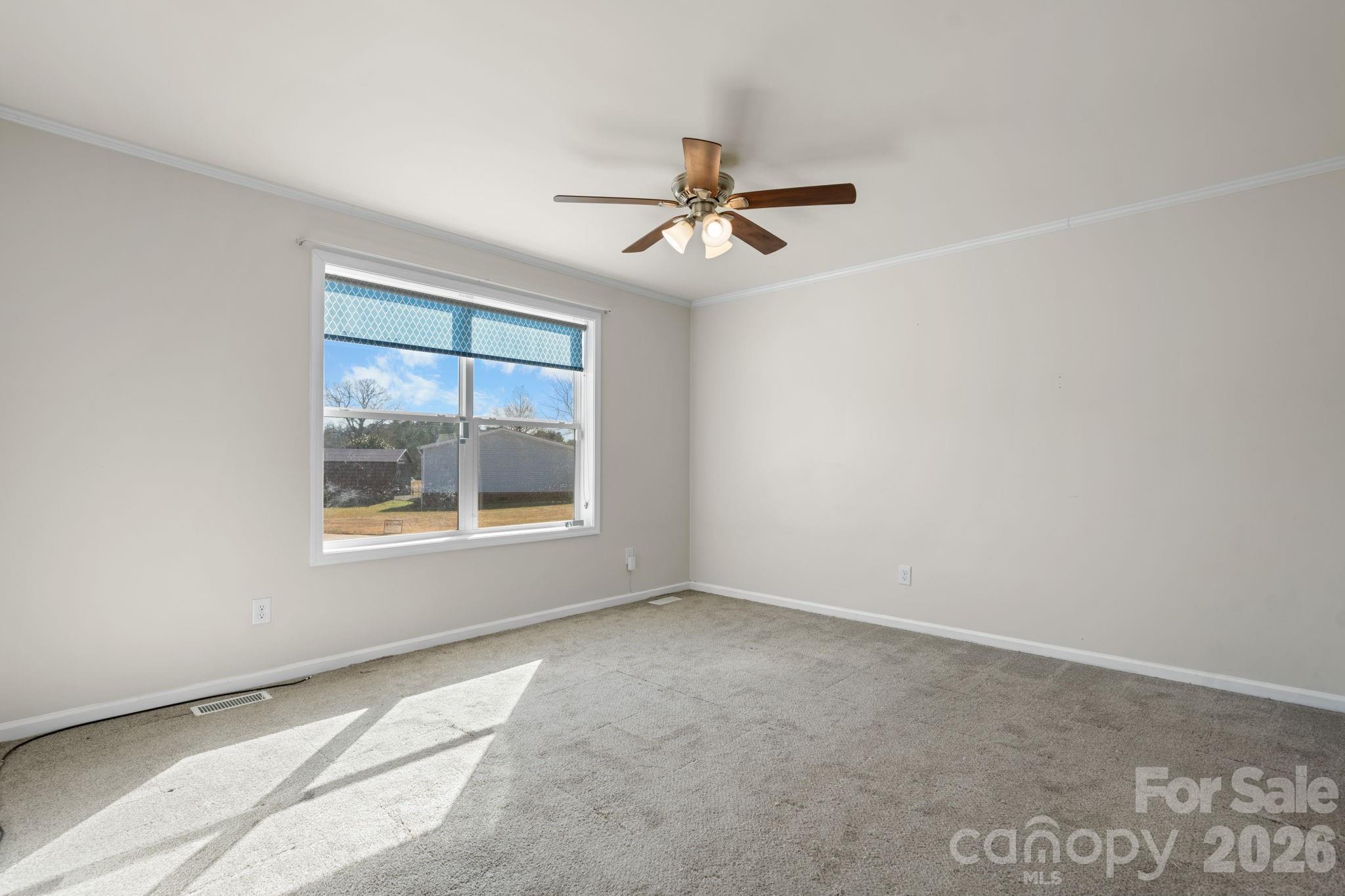 999 Stone Throw Drive Concord, NC 28025 - Photo 15 of 23 an empty room with a window