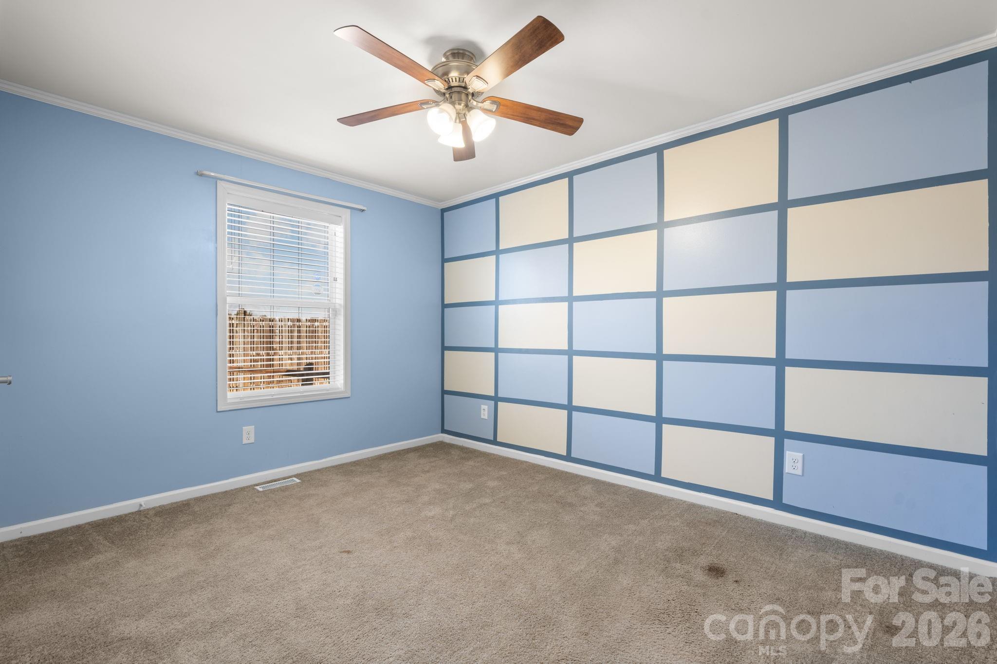 999 Stone Throw Drive Concord, NC 28025 - Photo 17 of 23 a view of an empty room with a window
