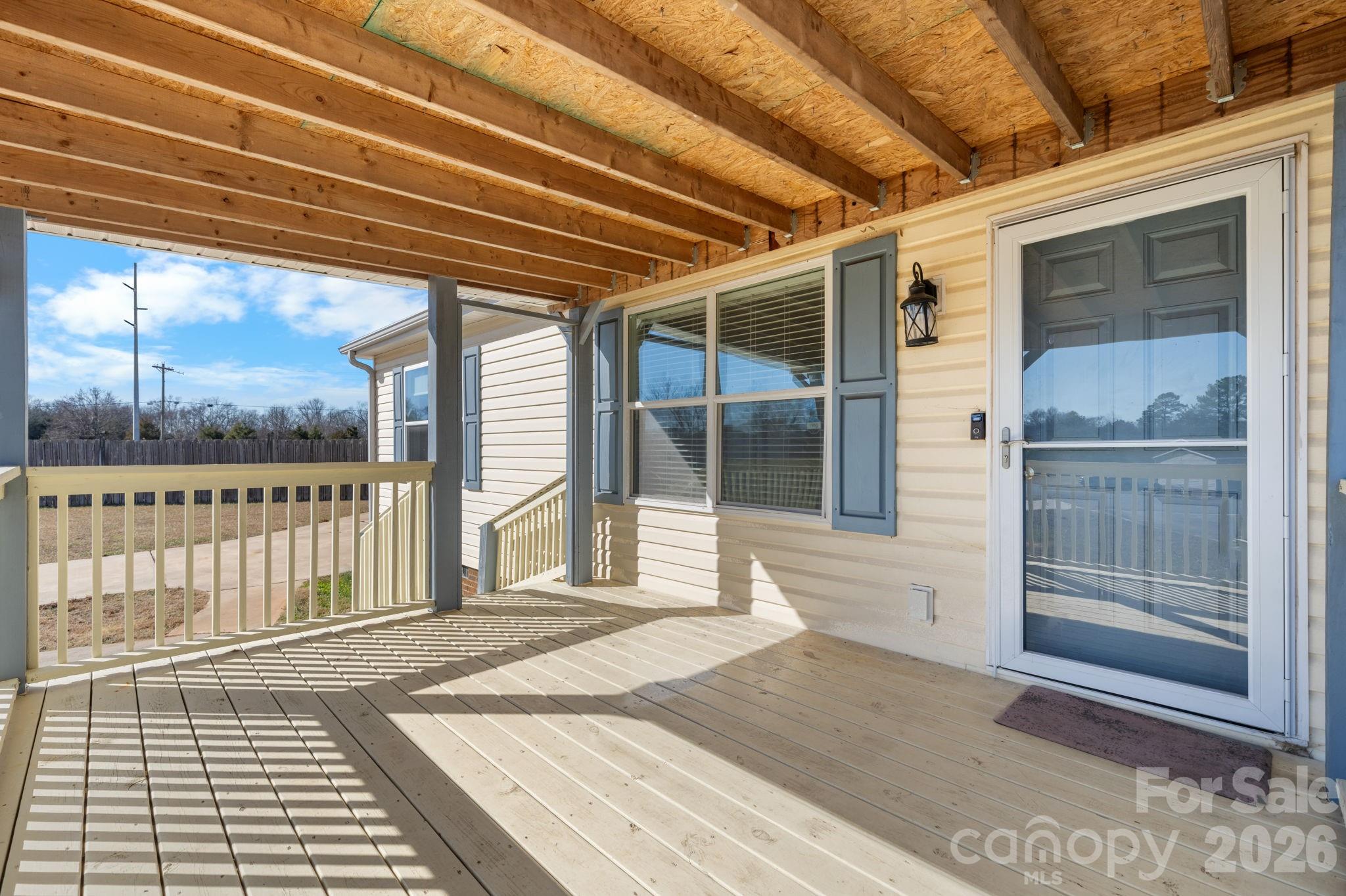 999 Stone Throw Drive Concord, NC 28025 - Photo 20 of 23 a porch with view of front door
