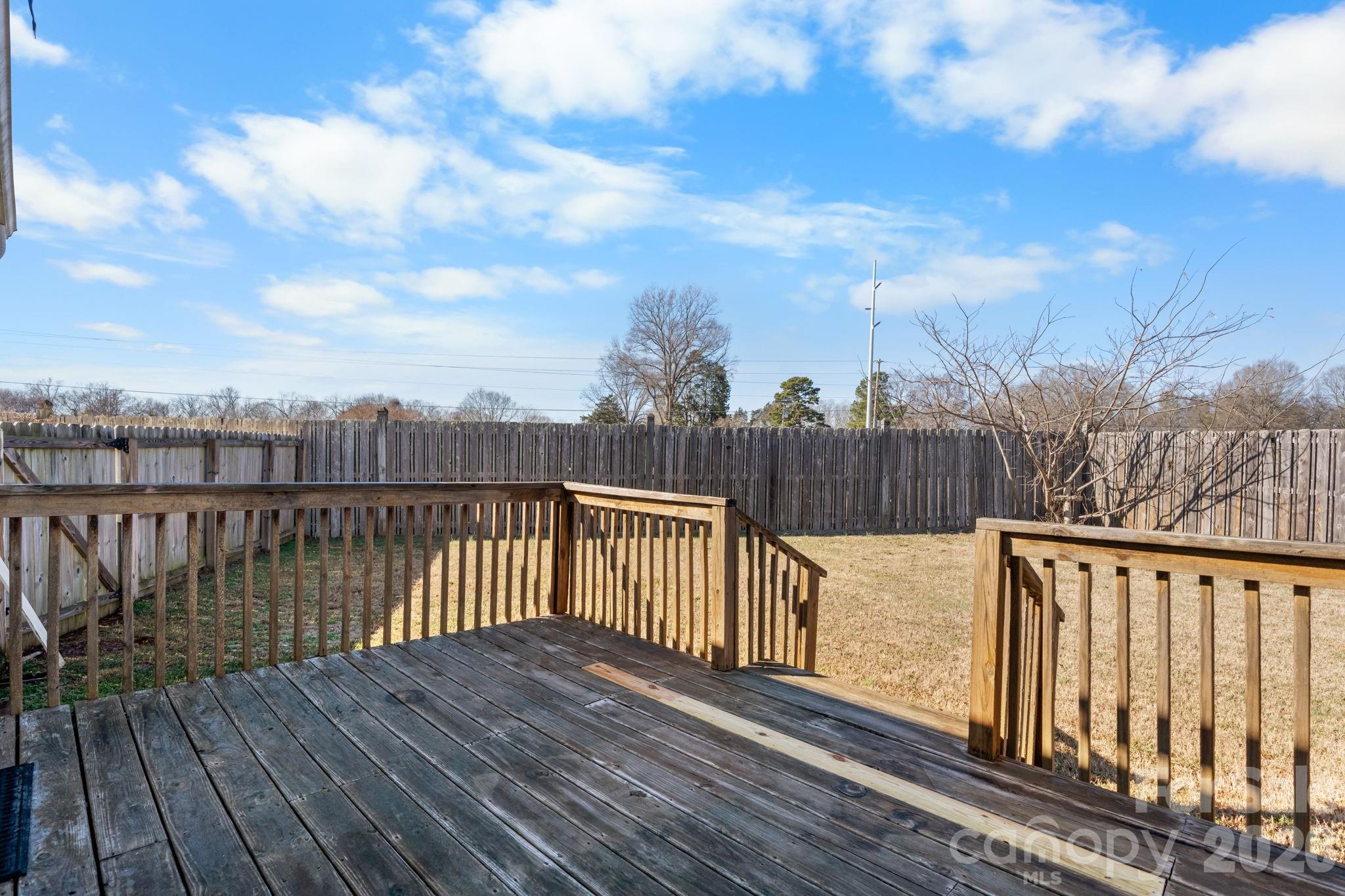 999 Stone Throw Drive Concord, NC 28025 - Photo 23 of 23 a view of wooden deck