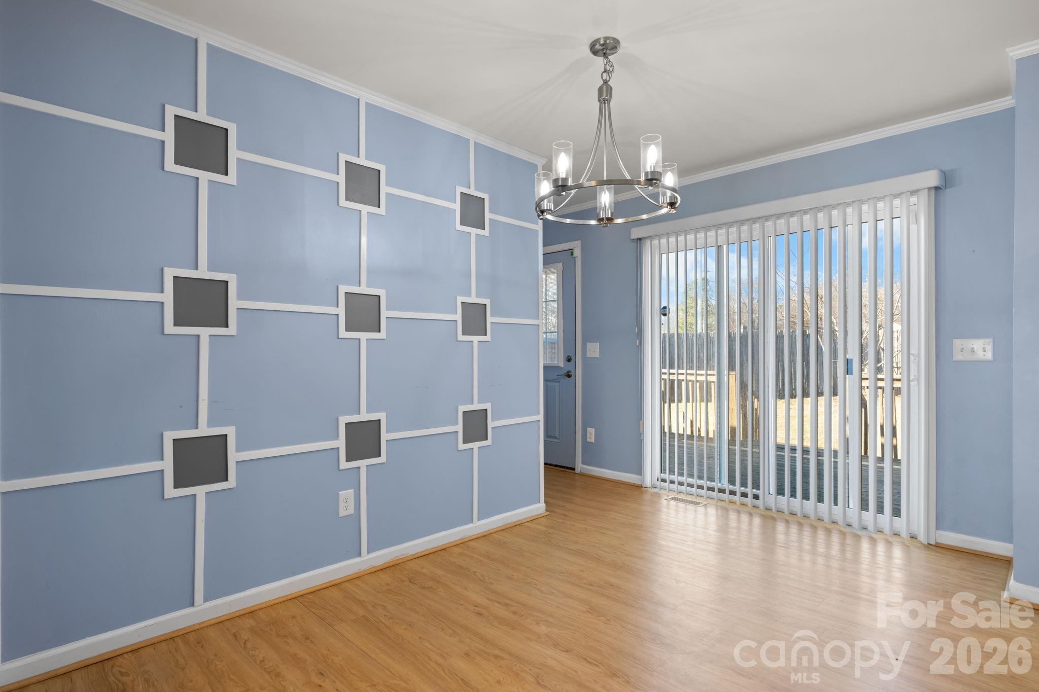 999 Stone Throw Drive Concord, NC 28025 - Photo 8 of 23 a view of a hallway with windows