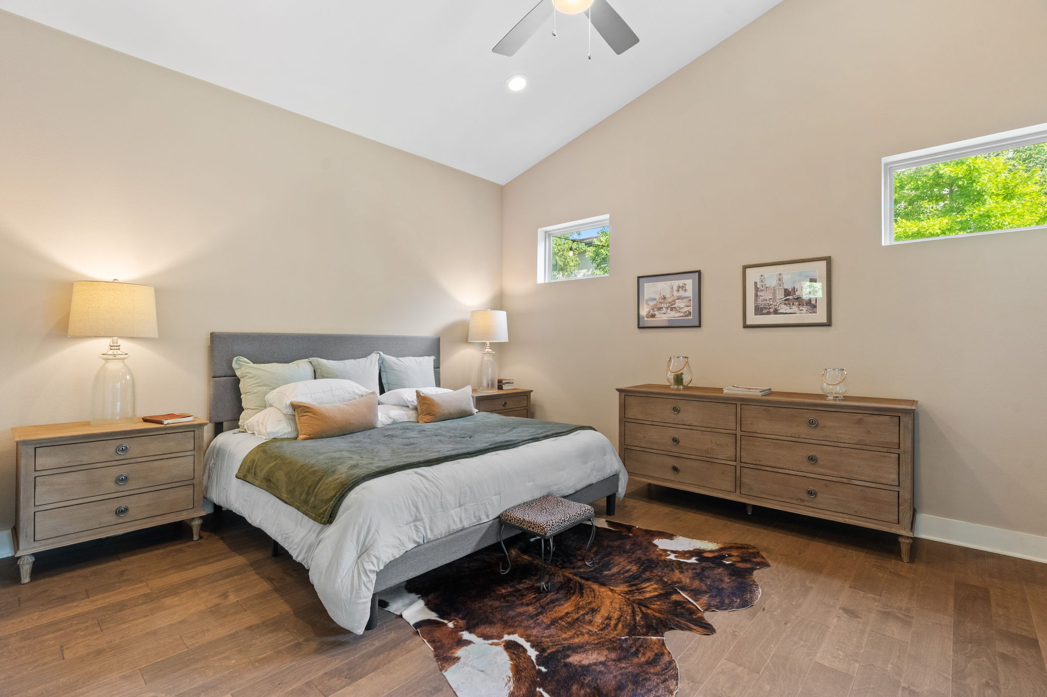 3707 Birch Street, Unit B Austin, TX 78704 - Photo 24 of 40 The primary bedroom is tucked away at the back of the home with lofted ceilings and lovely windows.