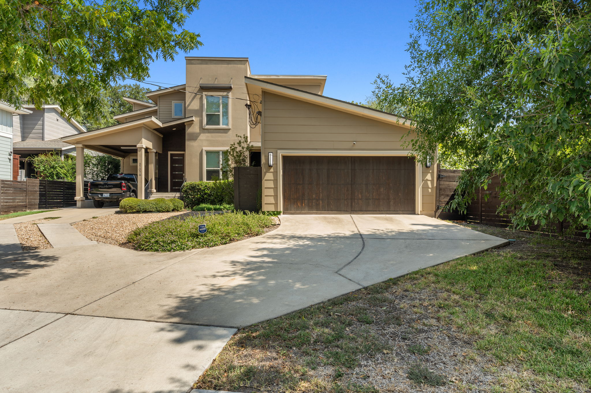 3707 Birch Street, Unit B Austin, TX 78704 - Photo 7 of 40 The 2 car garage provides convenient parking or storage options, not to mention added safety and security.