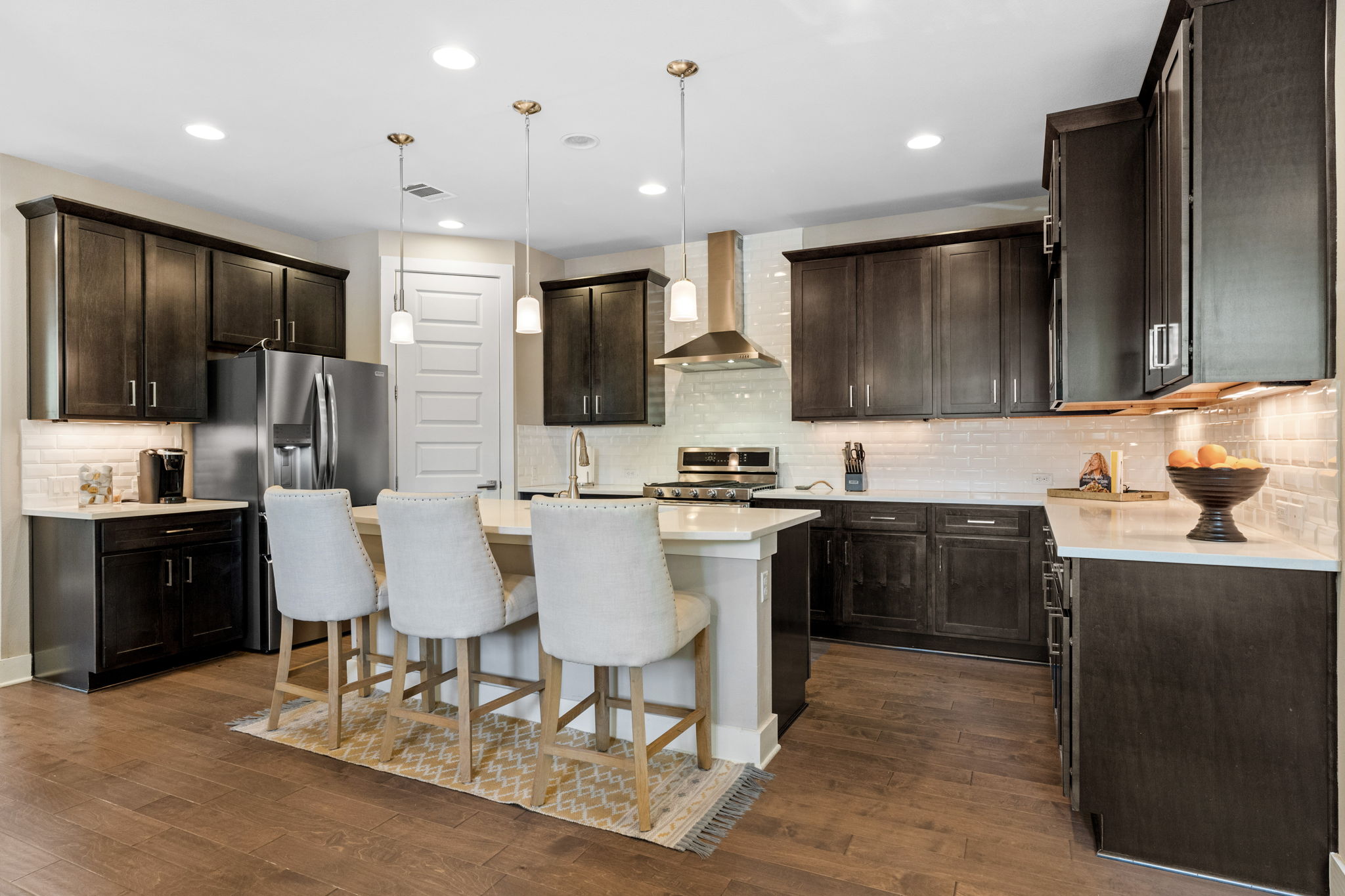 3707 Birch Street, Unit B Austin, TX 78704 - Photo 9 of 40 Gorgeous dark cabinetry provides plenty of storage options.