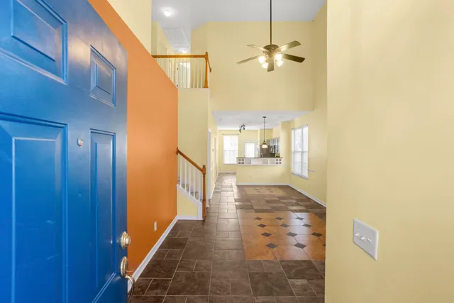 a bathroom with a glass shower door