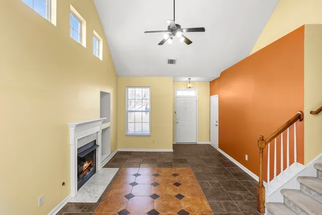 a view of an entryway with a fireplace