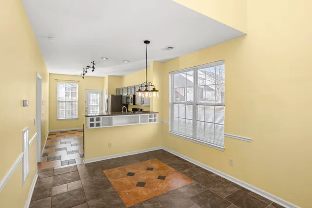 a large bathroom with a glass door shower