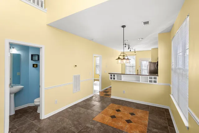 a view of a kitchen with a sink and dishwasher