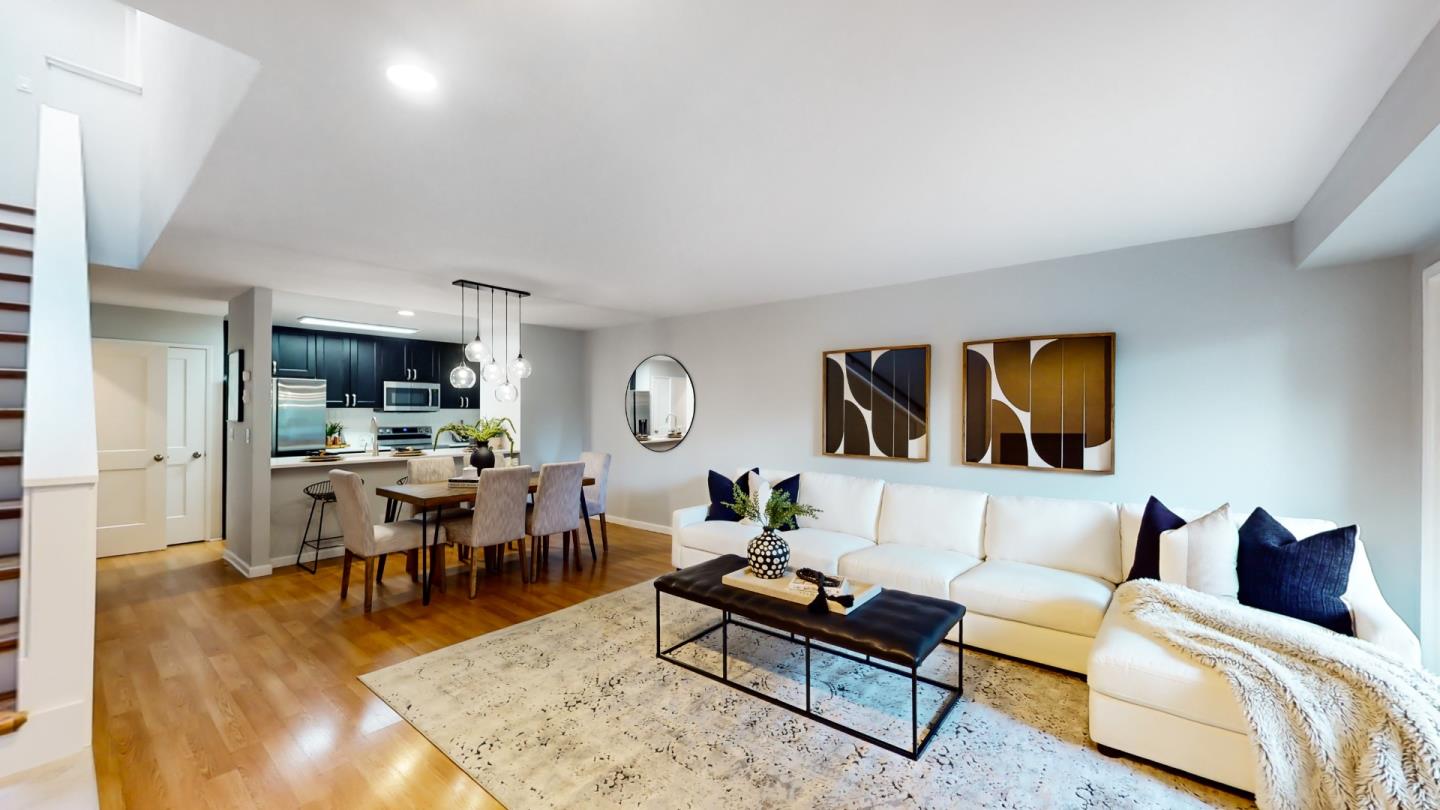 2201 The Alameda, Unit 27 Santa Clara, CA 95050 - Photo 1 of 25 a living room with furniture and wooden floor