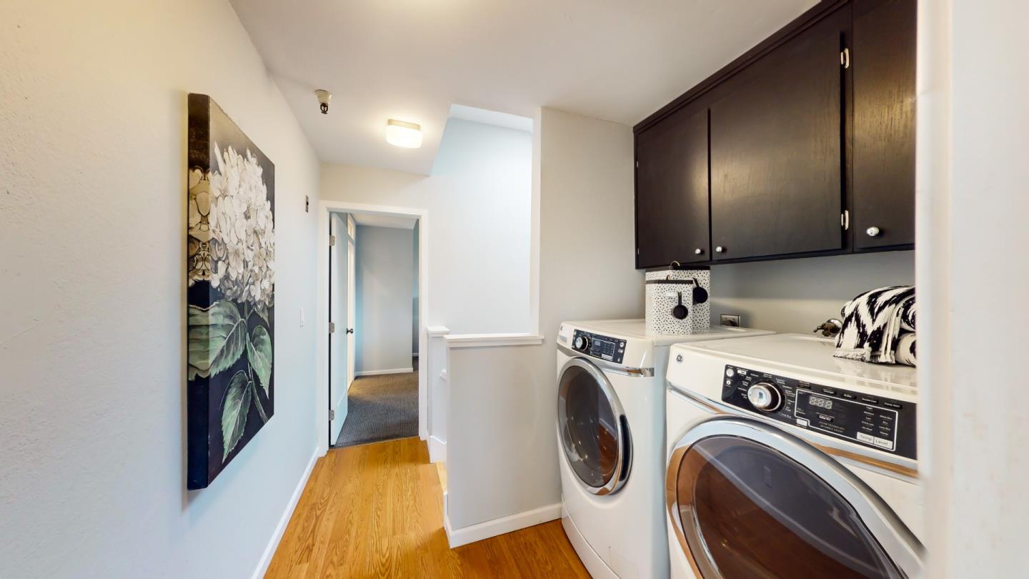 2201 The Alameda, Unit 27 Santa Clara, CA 95050 - Photo 12 of 25 a view of a kitchen with washer and dryer