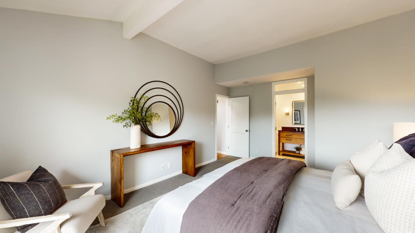 2201 The Alameda, Unit 27 Santa Clara, CA 95050 - Photo 14 of 25 a bedroom with a bed mirror and a window