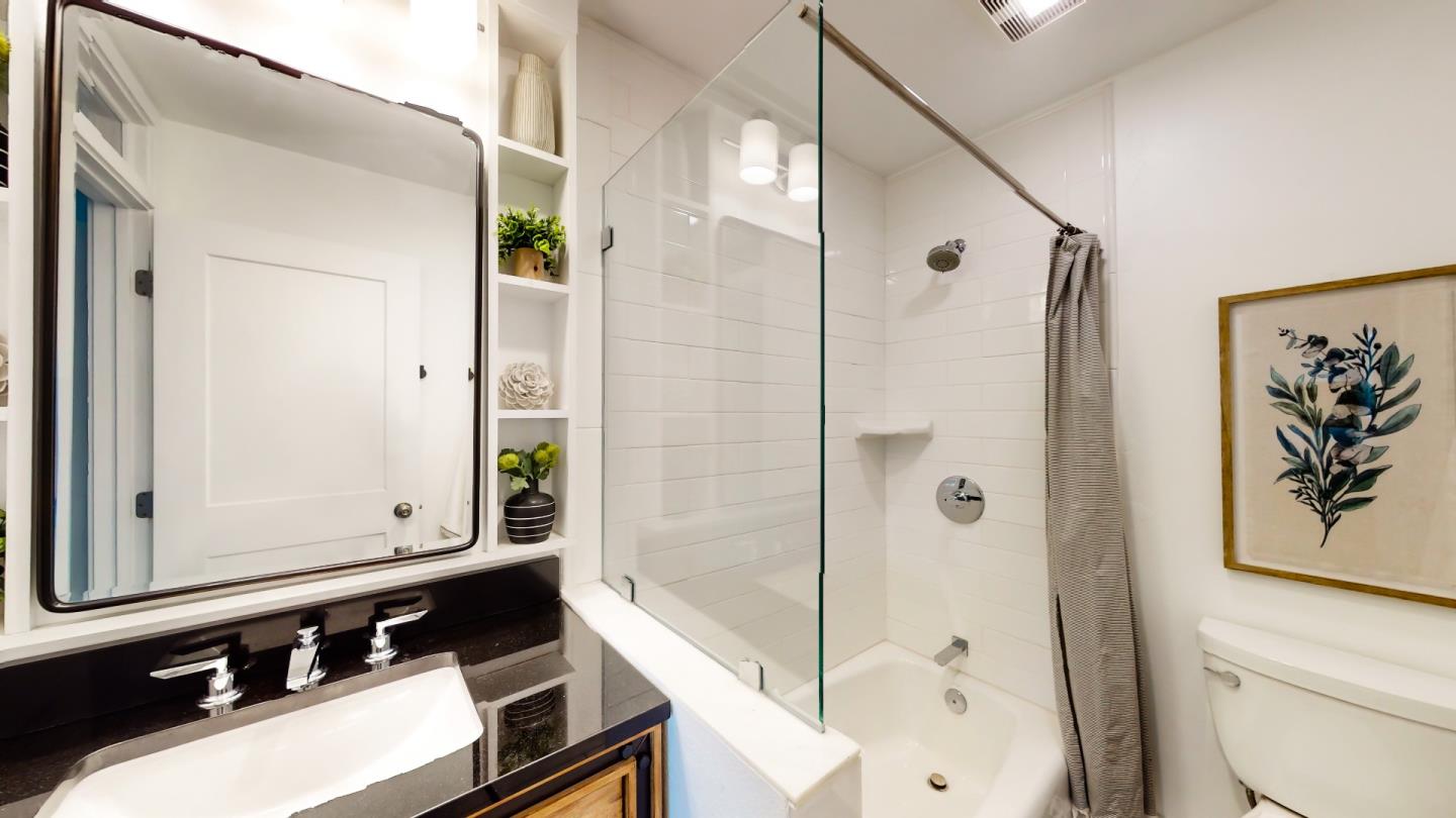 2201 The Alameda, Unit 27 Santa Clara, CA 95050 - Photo 16 of 25 a bathroom with a bathtub and a shower