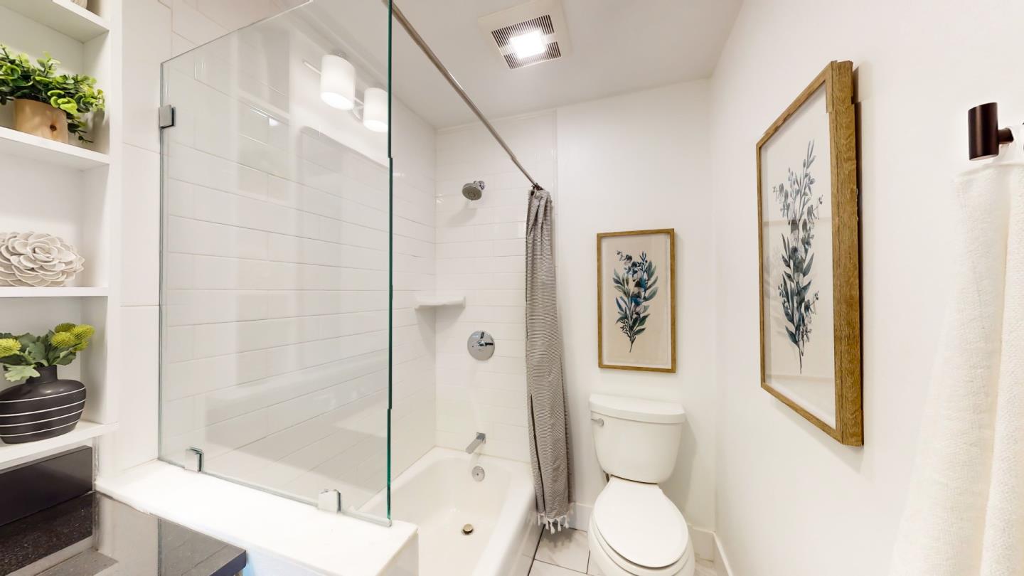 2201 The Alameda, Unit 27 Santa Clara, CA 95050 - Photo 22 of 25 a bathroom with a toilet sink and shower